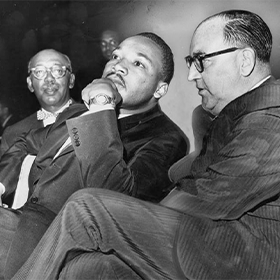 Martin Luther King and Governor Edmund G. Brown during a Freedom Rally at the Los Angeles Sports Arena in 1961.