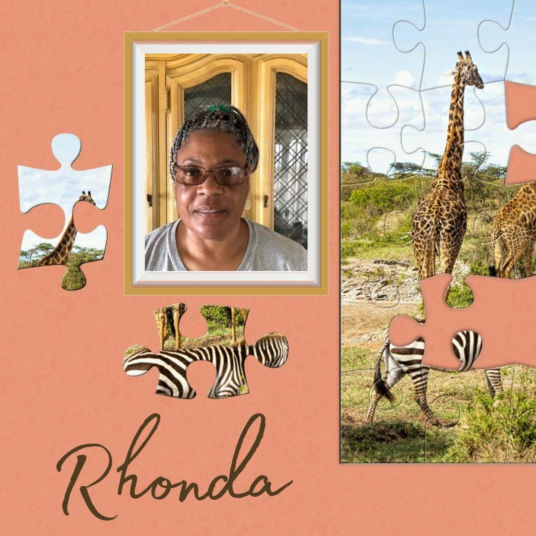 Rhonda’s photo hangs on a wall beside an animal jigsaw puzzle—one of her favorite hobbies.