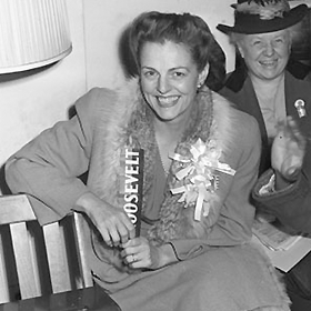 Future congresswoman Helen Gahagan Douglas sits around a radio awaiting the results of the 1940 election.