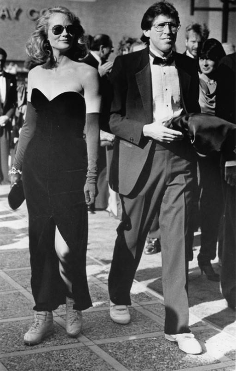 Cybill Shepherd paired her slinky black evening gown with matching ankle socks and fluorescent Reeboks