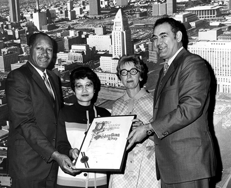 Mayor Bradley and councilman Ferraro present proclamation to Marilyn Tamura, and Daisy Jones
