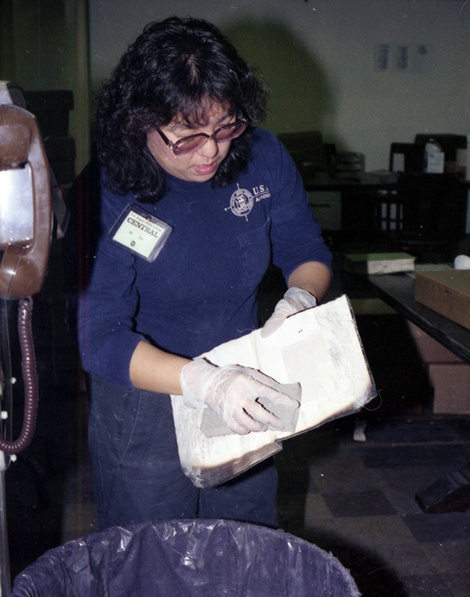 women cleaning books