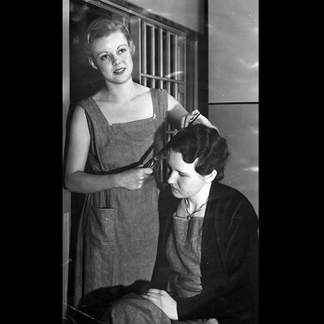 Burmah White and one of her jail companions, Ruth Dollins, in preparation for the latter's appearance in court on a check charge