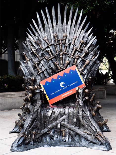 Game of Thrones throne with giant library card
