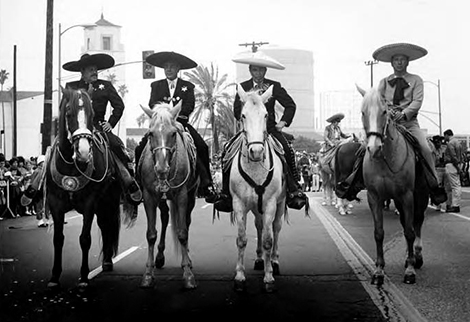 four men on horseback