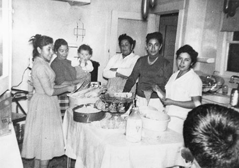 members of the Vasquez family preparing tamales