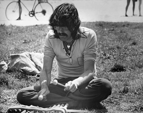 street musician playing a xylophone