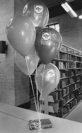 Books and balloons greet guests