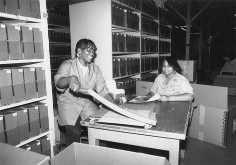 Staffers Sheila and Felicia busy organizing the Herald Examiner Collection at the Rio Vista warehouse
