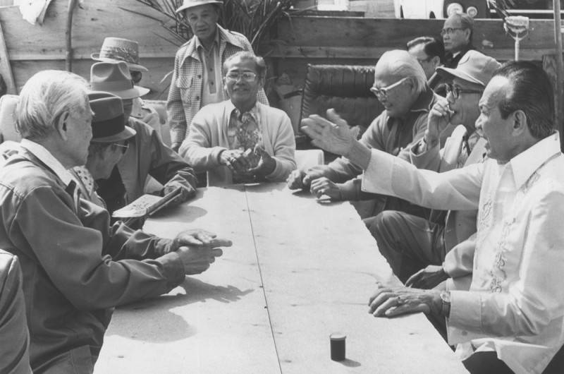 Eldery Filipinos playing cards 