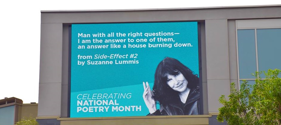 Image of Suzanne Lummis by Rachael McCampbell, billboard photo by Elena Secota