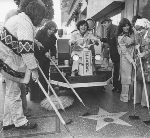 Councilwoman Peggy Stevenson cleaning up