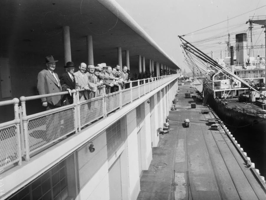 Bernard J Caughlin showing off the new terminal to visiting Los Angeles City Councilmen
