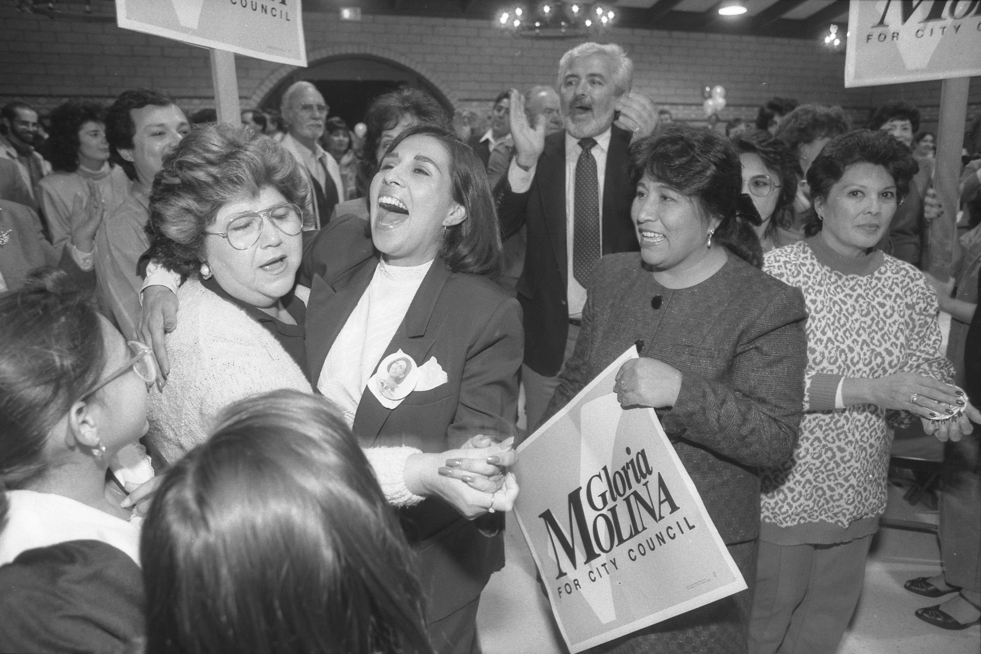 Gloria Molina and supporters celebrating after city council victory