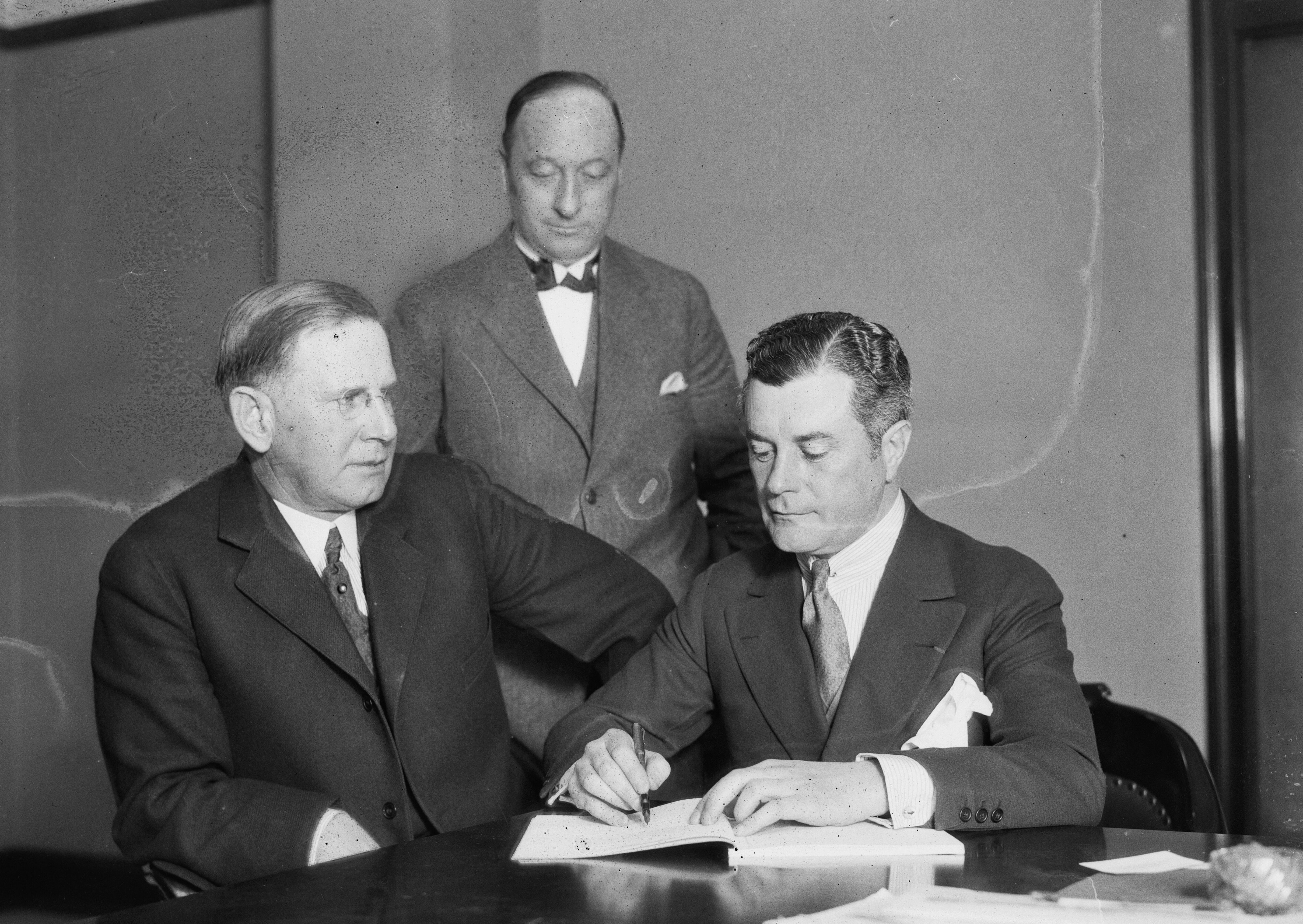 John McEnee Bowman (right) with James R. Martin, secretary treasurer for the Central Investment Company and Lee A. Phillips, President of Central Investment Company