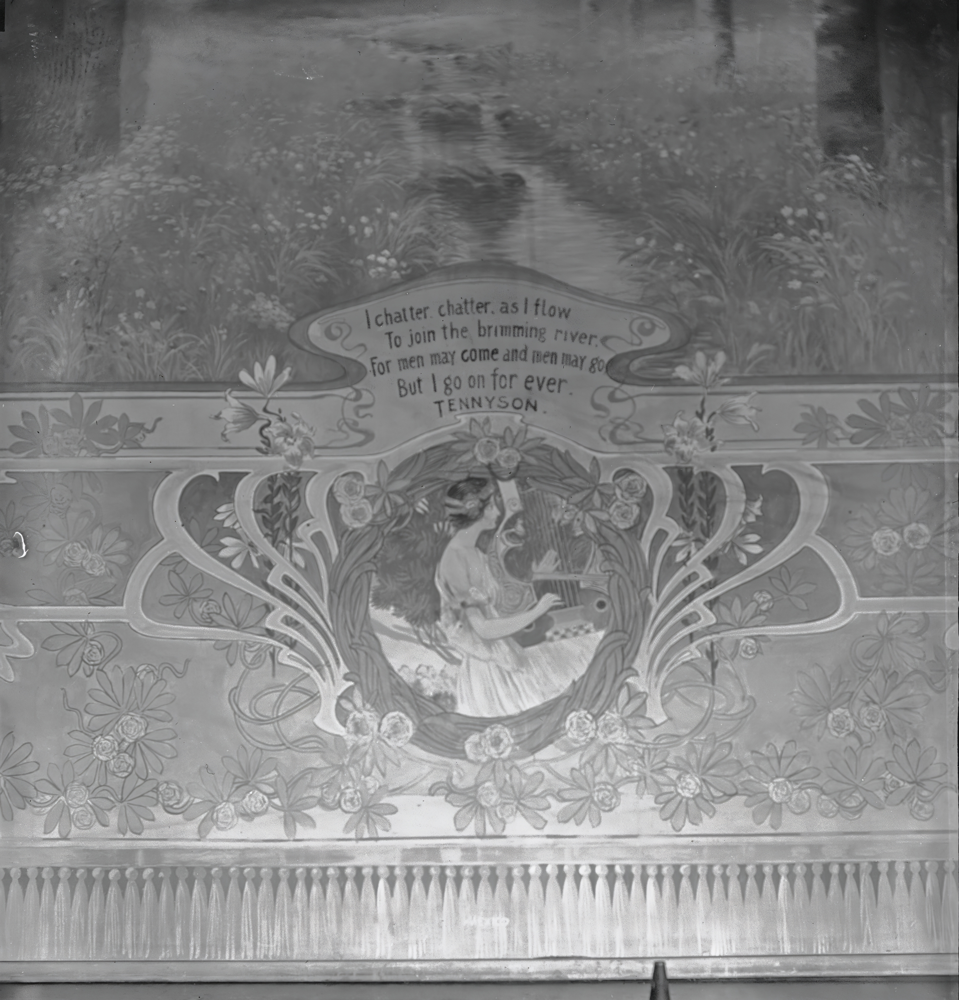 Close-up of the central image on the stage curtain