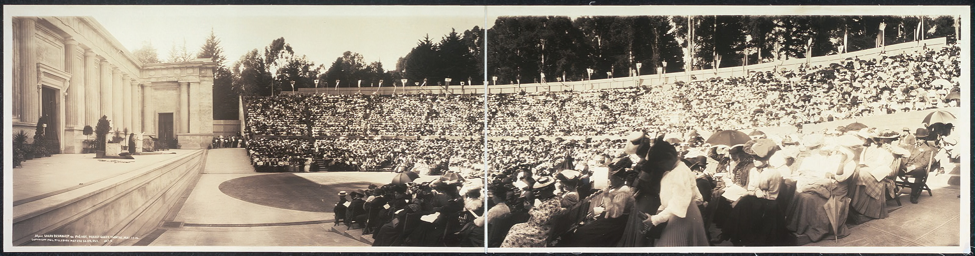 Panorama image showing a standing room only crowd