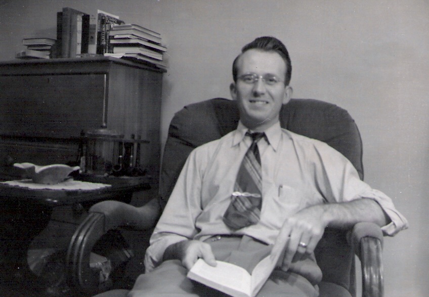 Man reading a book 1950