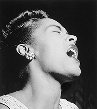 a ide profile black and white photo of a young singing Billie Holiday