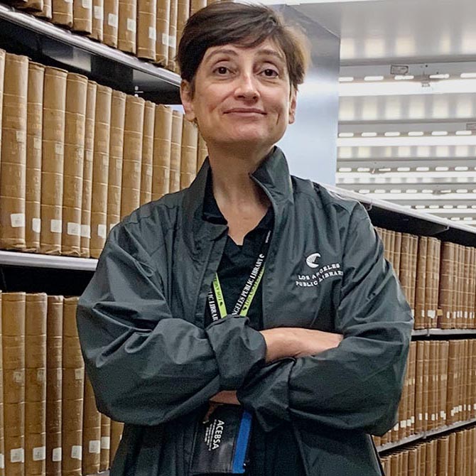 librarian in the book stacks