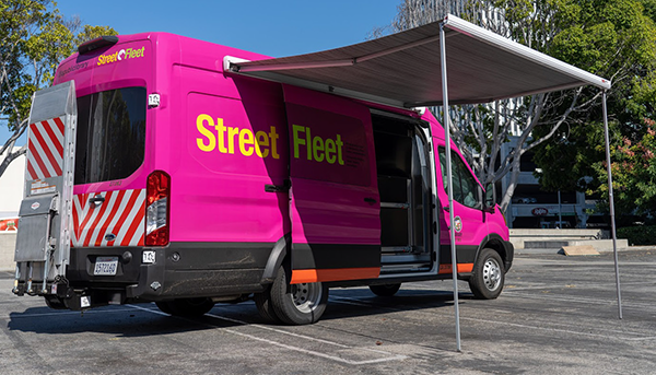 street fleet van parked with awning open