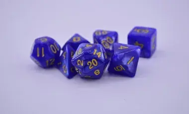 set of purple multi-sided dice