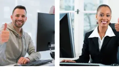 a smiling man sitting at his desk and computer and a smiling woman sitting at her desk and computer