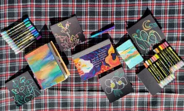 Photos of journals and coloring materials. 