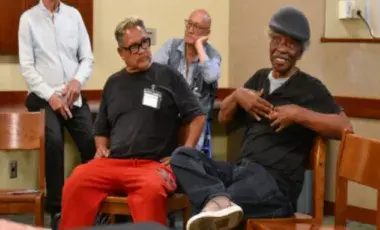 individuals participating in neighborhood sing program