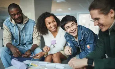 A group of happy adults talking and laughing together