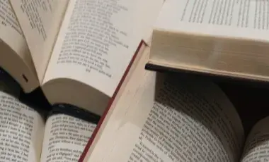 several open books with text