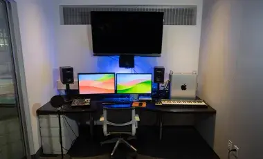 The studio room of the Octavia Lab with audio visual editing equipment.