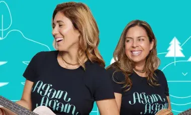 Two women singing and dancing in English and Spanish language for kids.