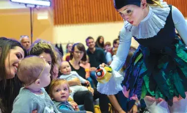 Babies with a puppet