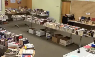 A used book sale in the library's community room