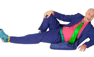 Christopher T. Magician in a blue suit