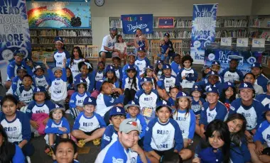Children attending a Dodgers Storytime posing for a group photo