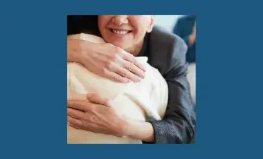 Two people hugging