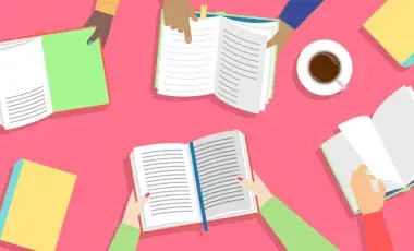 books open on pink table