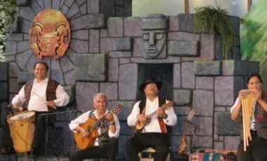 A group of four musicians playing music