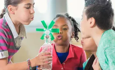 Kids doing a science experiment.