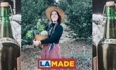 Brie holding a container of vegetables