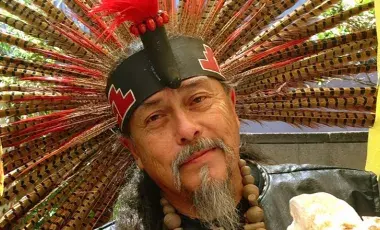 man with feather headdress