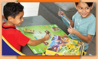 Two kids playing Pokemon 