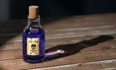 A bottle marked poison filled with a purple liquid, Image by qimono from Pixabay