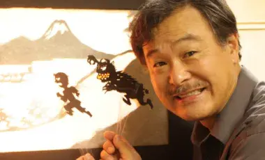 Mr. Seki showing his shadow puppets.