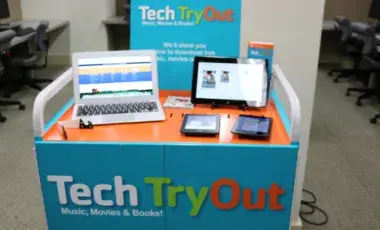 blue computer cart with a tablet and 
