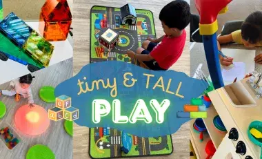 kids playing with toys, play kitchen, and light tables