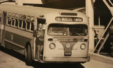 Historic Los Angeles bus with cut-out of Shakespeare hanging out of the door