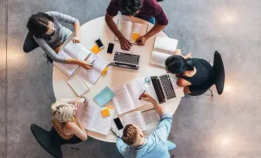 Students sitting around a table